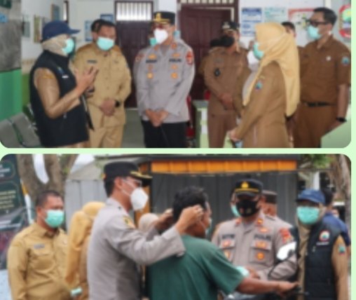 *Kapolres AKBP Deddy Tinjau Dampak Erupsi Gunung Anak Krakatau, Bagikan Masker kepada Warga Palas*